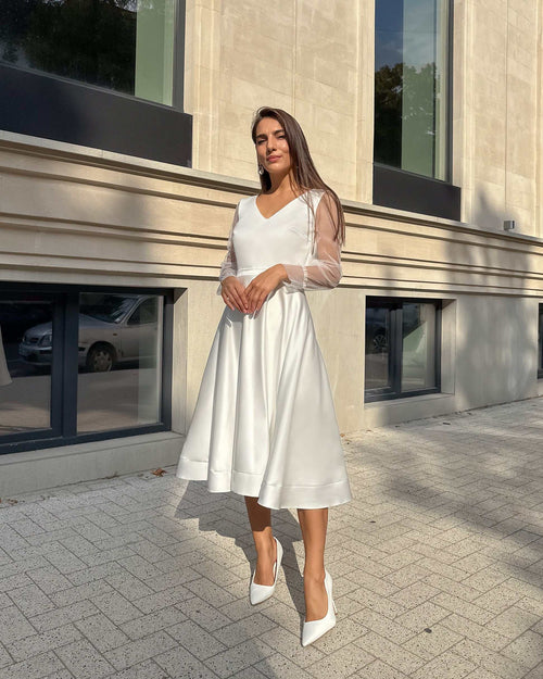 Rochie cununie civila cu mâneci lungi și transparente, centură fixă, look elegant.