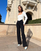 Pantaloni evazati negri pentru femei, confortabili, eleganți, stil versatil, talie înaltă.