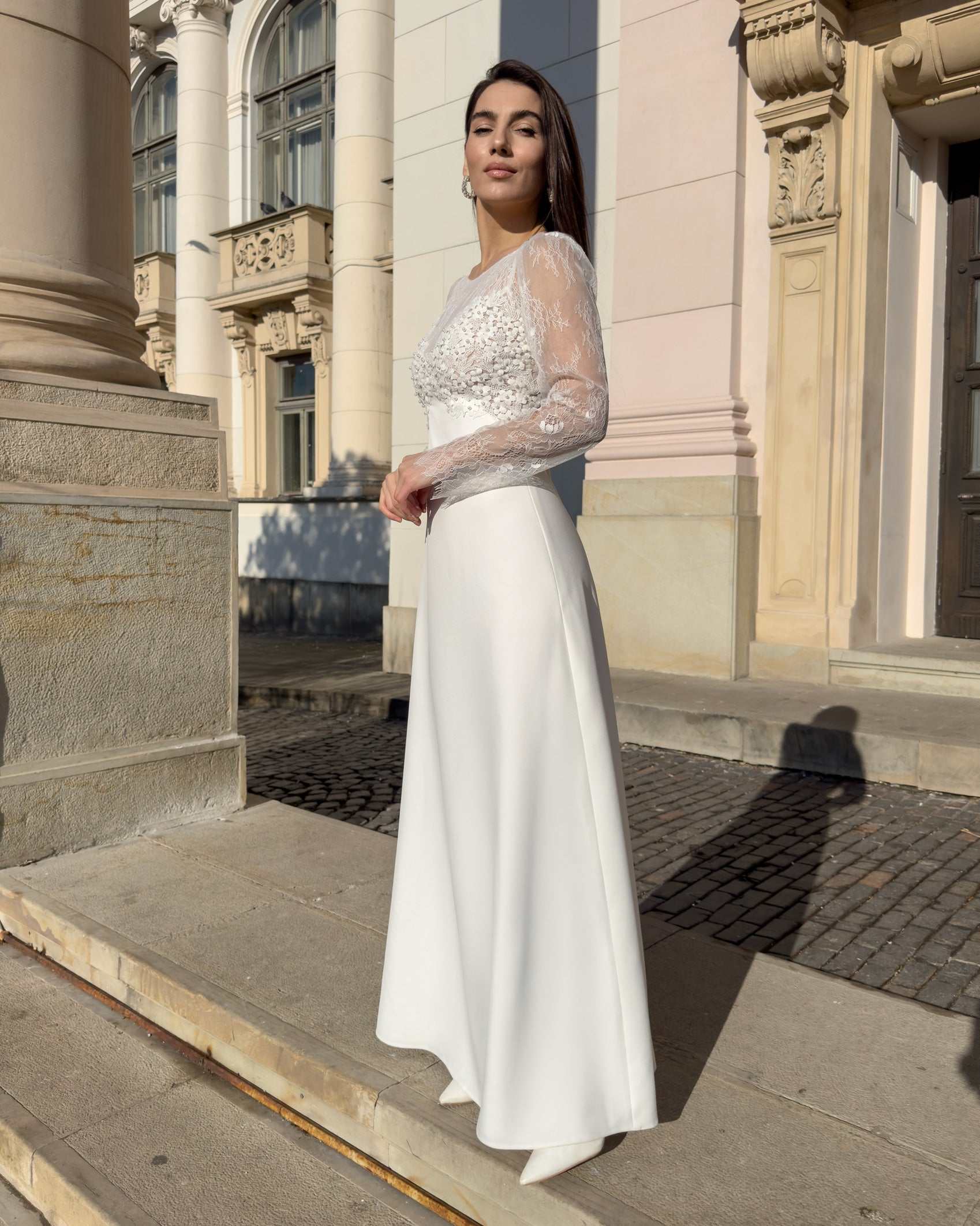 Elegantes Brautkleid mit Spitzenärmeln